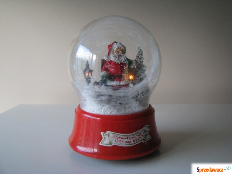 Duża obracająca się i świecąca kula śnieżna z... - Dekoracje świąteczne - Brzegi