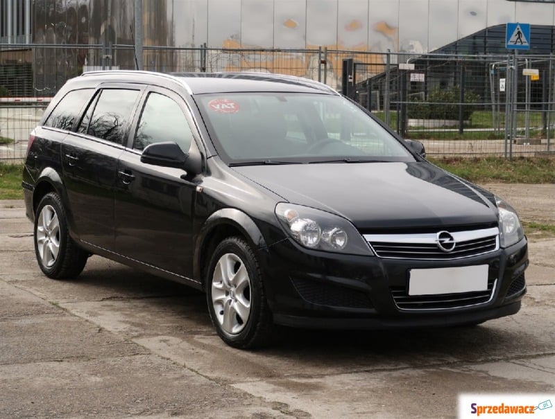 Opel Astra  Kombi 2012,  1.6 benzyna - Na sprzedaż za 19 511 zł - Koszalin