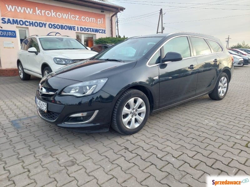 Opel Astra  Kombi 2014,  1.4 - Na sprzedaż za 35 200 zł - Malutkie