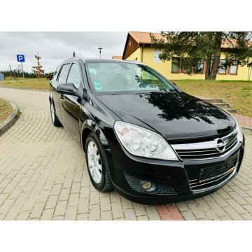 Opel Astra 2009,  1.6 benzyna - Na sprzedaż za 13 900 zł - Dolna Grupa - zdjęcie 2