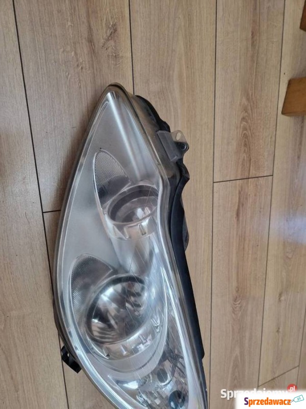 Reflektor lampa lewa Opel Corsa D Europa 13186381 - Lampy przednie - Bydgoszcz