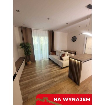 Na wynajem apartament z ogródkiem