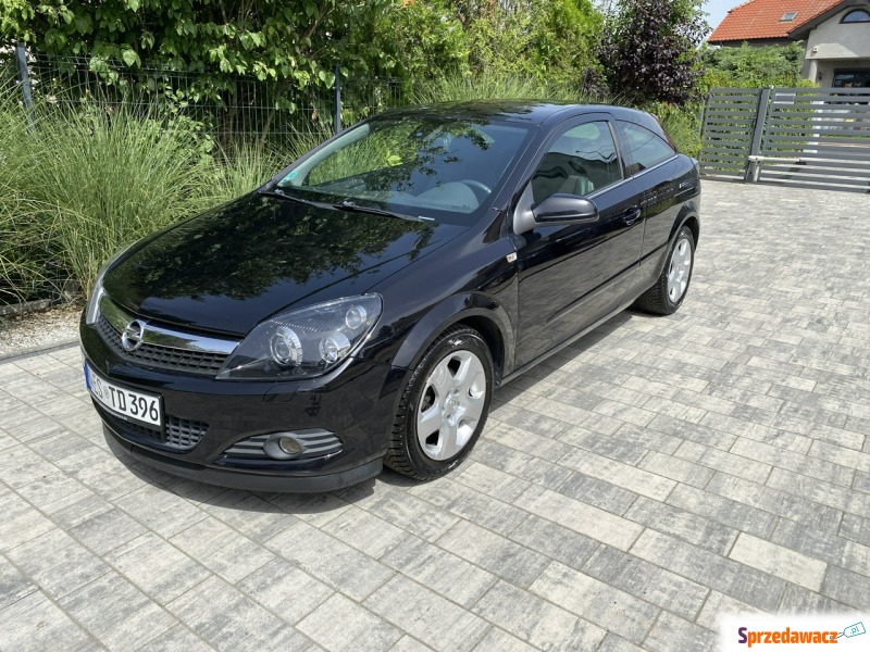 Opel Astra  Hatchback 2009,  1.8 benzyna - Na sprzedaż za 14 900 zł - Poznań