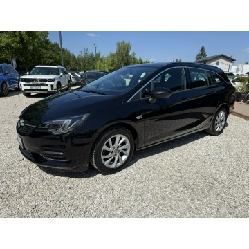 Opel Astra  Kombi 2022,  1.3 benzyna, automat - Na sprzedaż za 59 900 zł - Pęcice - zdjęcie 2