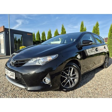 Toyota Auris  Hatchback 2014,  1.3 benzyna - Na sprzedaż za 36 900 zł - Łosino - zdjęcie 9