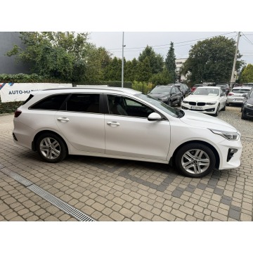 Kia Ceed  Kombi 2019,  1.4 benzyna, automat - Na sprzedaż za 56 900 zł - Orzech - zdjęcie 5