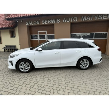 Kia Ceed  Kombi 2019,  1.4 benzyna, automat - Na sprzedaż za 56 900 zł - Orzech - zdjęcie 11