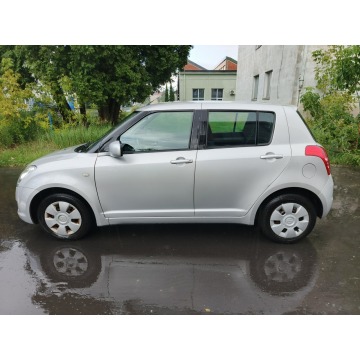 Suzuki Swift  Hatchback 2011,  1.3 benzyna - Na sprzedaż za 14 500 zł - Warszawa - zdjęcie 7