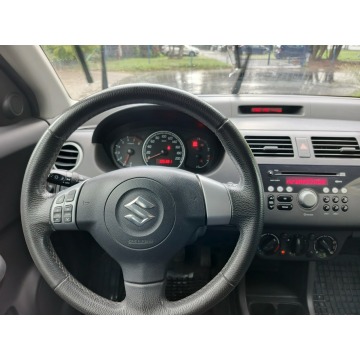 Suzuki Swift  Hatchback 2011,  1.3 benzyna - Na sprzedaż za 14 500 zł - Warszawa - zdjęcie 9
