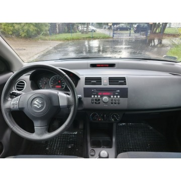 Suzuki Swift  Hatchback 2011,  1.3 benzyna - Na sprzedaż za 14 500 zł - Warszawa - zdjęcie 10