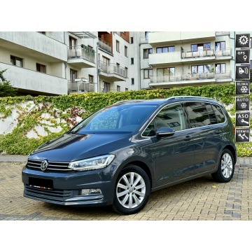 Volkswagen Touran - 1.8  Highline DSG