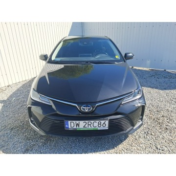 Toyota Corolla  Sedan/Limuzyna 2021,  1.8 hybryda, automat - Na sprzedaż za 57 933 zł - Komorniki - zdjęcie 2