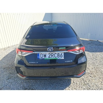 Toyota Corolla  Sedan/Limuzyna 2021,  1.8 hybryda, automat - Na sprzedaż za 57 933 zł - Komorniki - zdjęcie 5