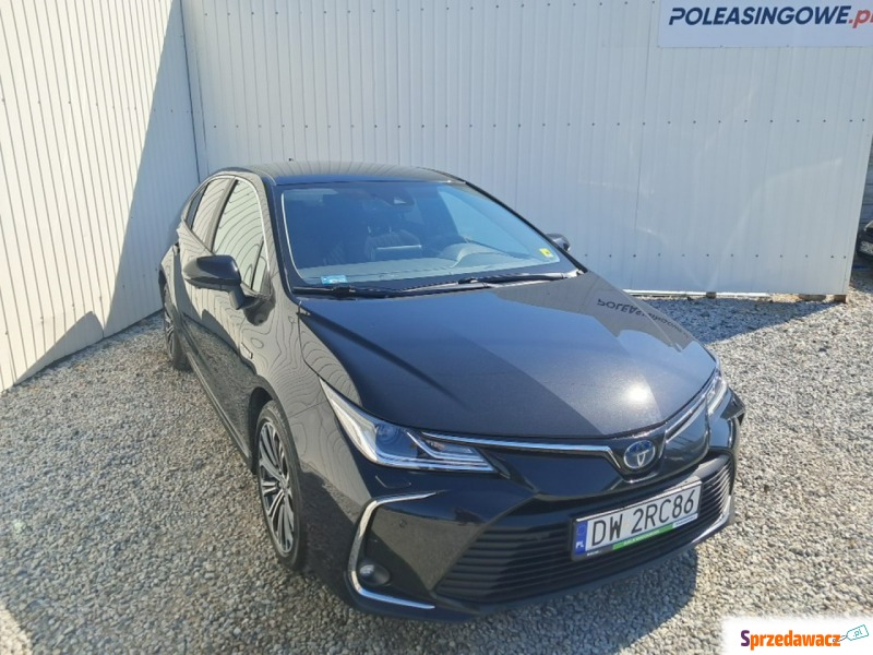 Toyota Corolla  Sedan/Limuzyna 2021,  1.8 hybryda, automat - Na sprzedaż za 57 933 zł - Komorniki