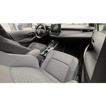 Toyota Corolla  Kombi 2022,  1.8 hybryda, automat - Na sprzedaż za 39 900 zł - Pyzdry - zdjęcie 11